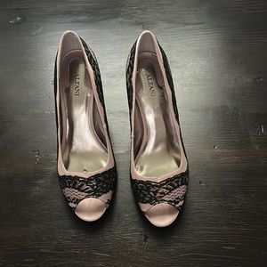 Pair of pale pink heels with black lace